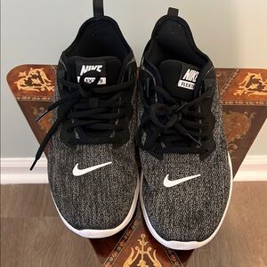 Nike Flex Black and white sneaker. Worn once. Size 9